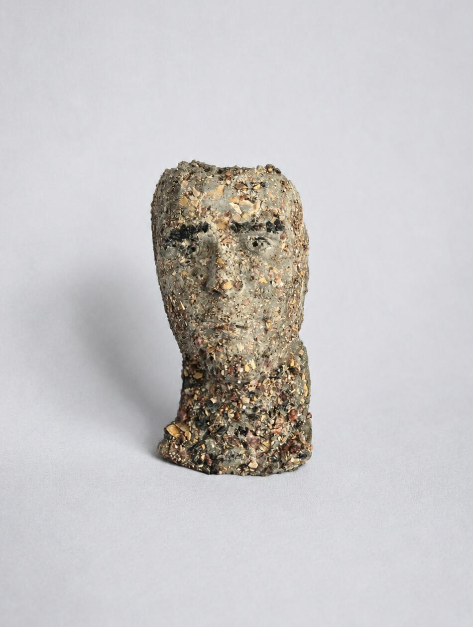 EMERGENCE (2026) Life sized partial bust. Fieldstone & concrete. (27 cm x 15 cm x 10 cm)