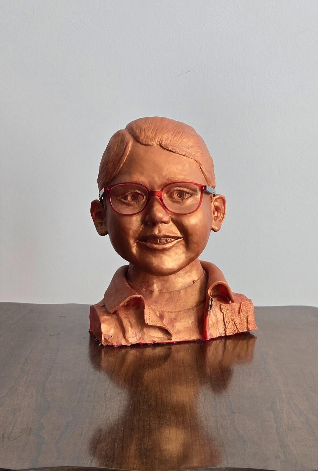 EMBER (2025) – Life sized portrait bust. Oil-based clay, bronze resin cold cast. (32 cm x 22 cm x 17 cm)