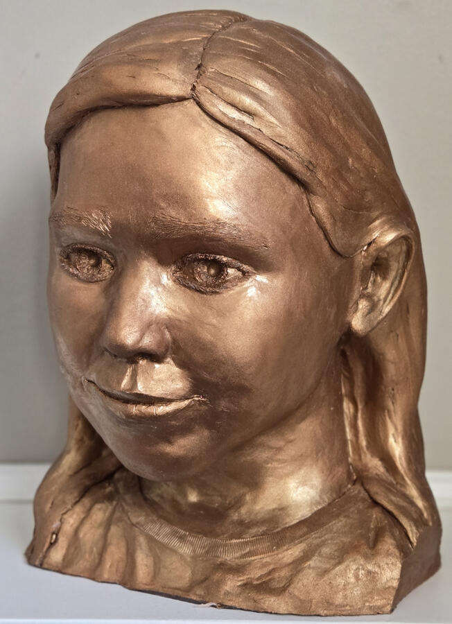 Life sized portrait study focused on softness of form, quiet expression, and the subtle balance between realism and presence. Oil-based clay, bronze resin cold cast. (31 cm x 21 cm x 16 cm)